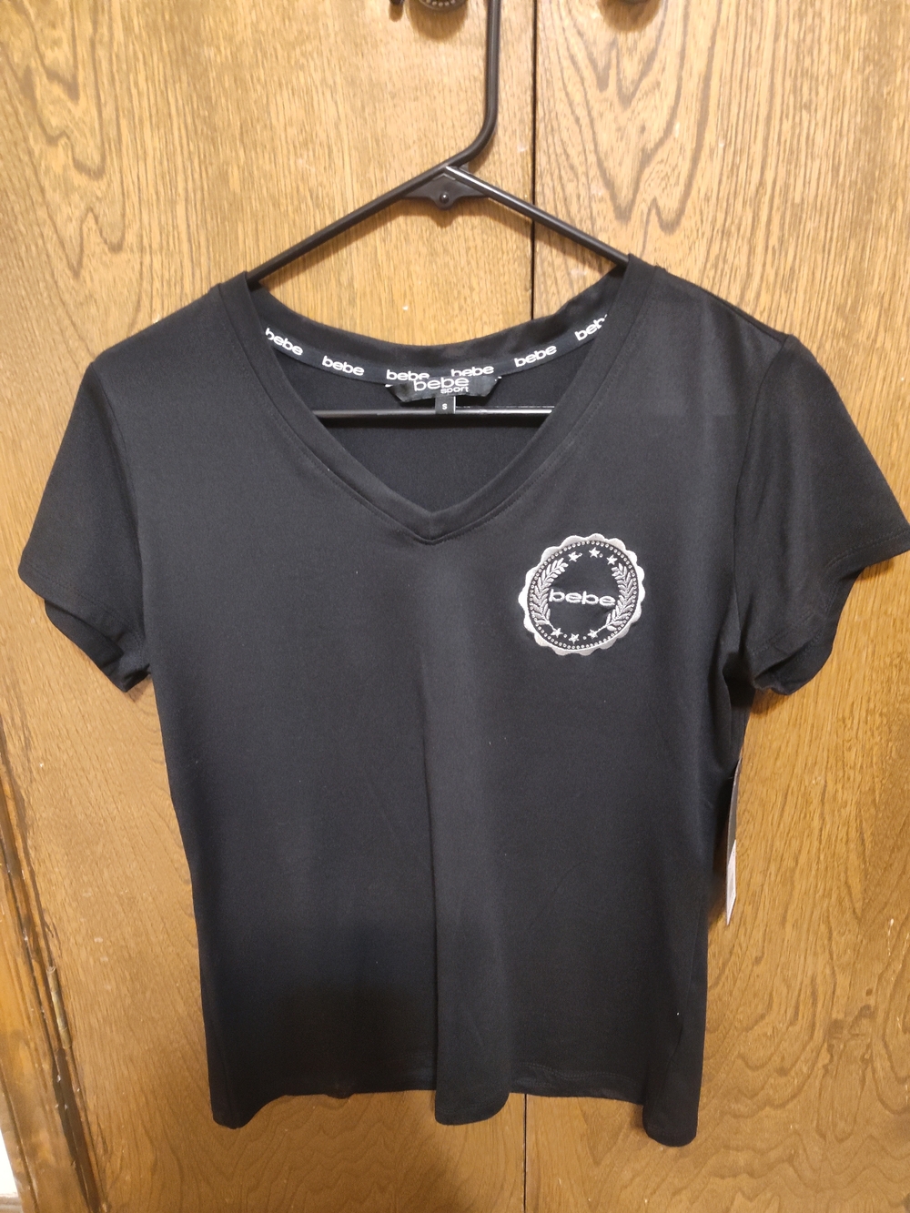 bebe Black V-Neck Short Sleeve Tee with Logo Emblem